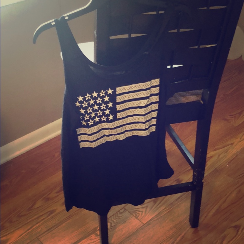 Star this July 4th with this flag tank top!
